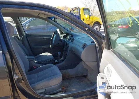 2001 Toyota Camry Le from USA, damaged, VIN 4T1BG22K11U834797